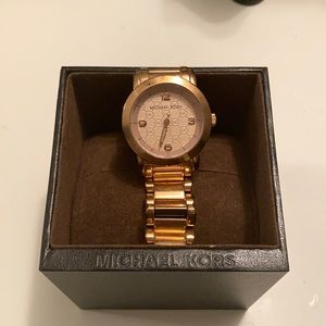 Michael Kors women’s rose gold watch